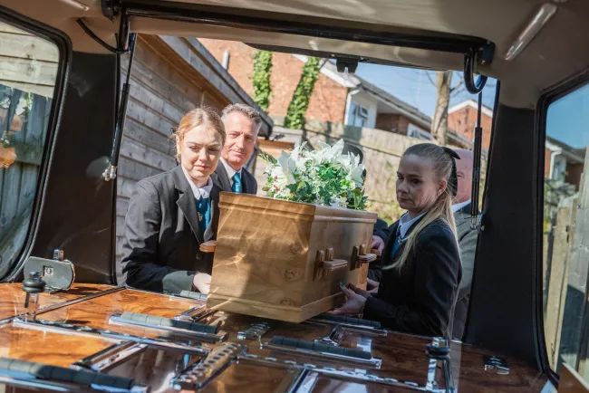 loading a coffin